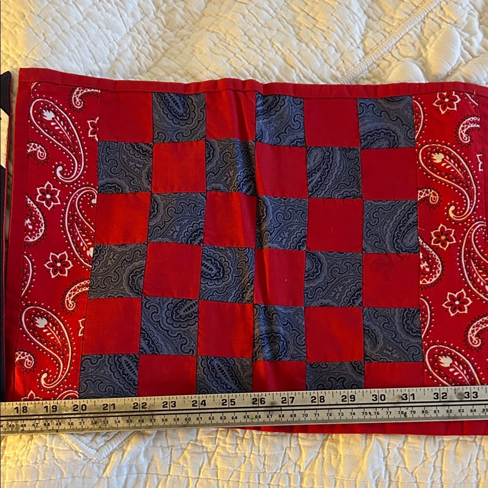 6 Reversible quilted bandana pattern style placemats. Cotton. Blue,red, & white.